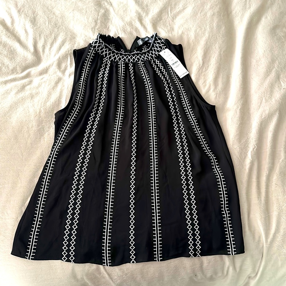 Size 2 WHBM sleeveless top.